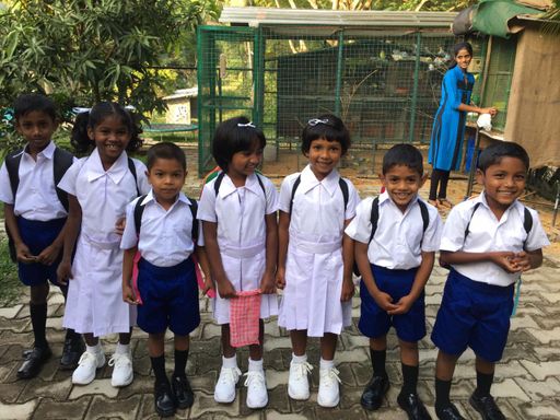 A group of Home of Hope children in school uniform, ready for school