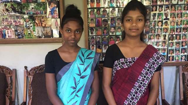 Angel and Meena from Home of Hope in saris, ready to start nursing school